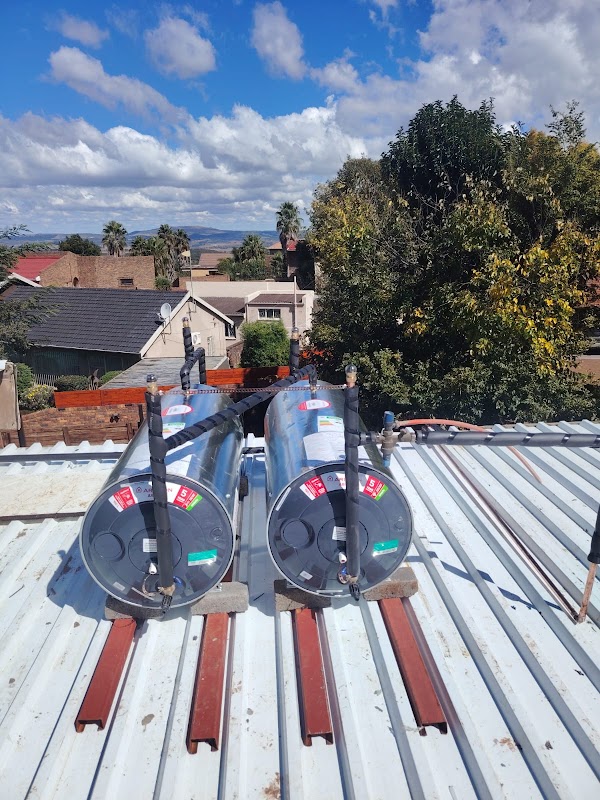 Two new geysers installed on a roof with pipework by Plumbers X